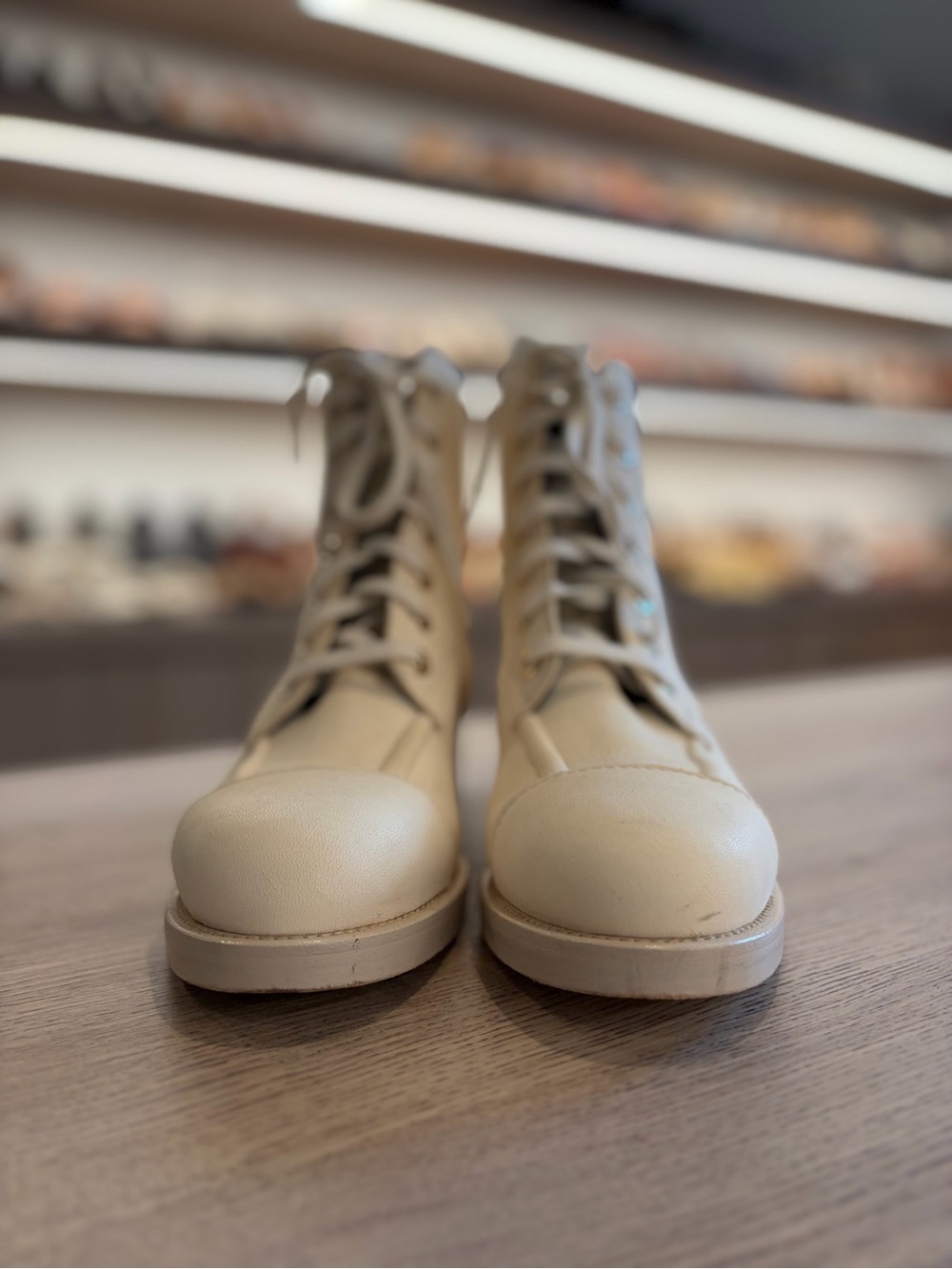 CHANEL Cream Leather Lace-Up Combat Boots with Navy CC - Picture 8 of 8